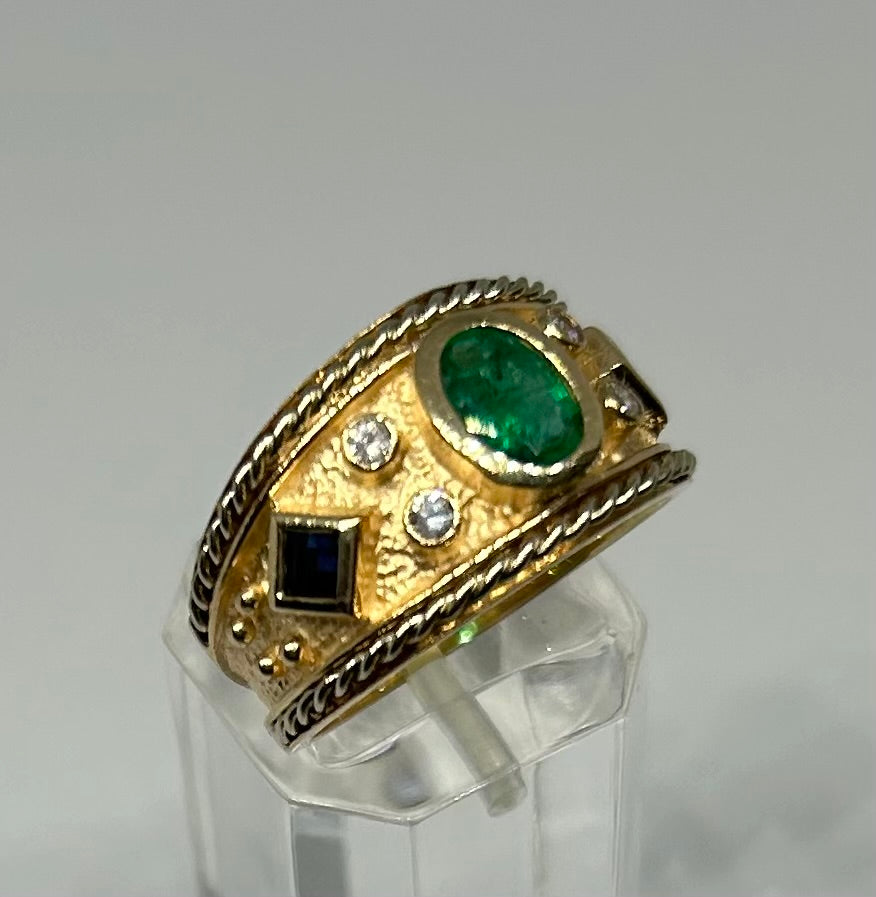 14K Yellow "Cigar Band" ring with Emerald, Sapphires and Diamonds