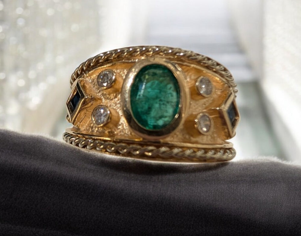 14K Yellow "Cigar Band" ring with Emerald, Sapphires and Diamonds